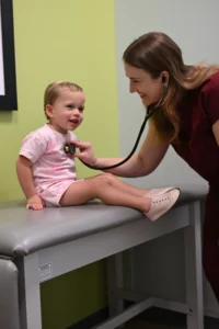 LAURA WISE, MD, FAAP with Patient