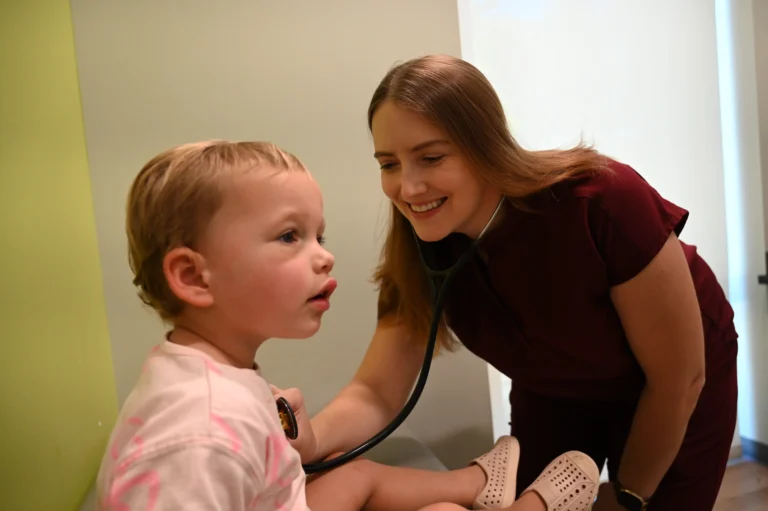 LAURA WISE, MD, FAAP with Patient