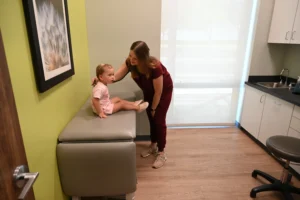 LAURA WISE, MD, FAAP with Patient