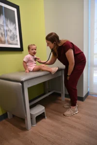 LAURA WISE, MD, FAAP with Patient