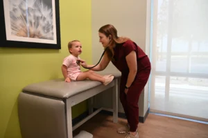 LAURA WISE, MD, FAAP with Patient